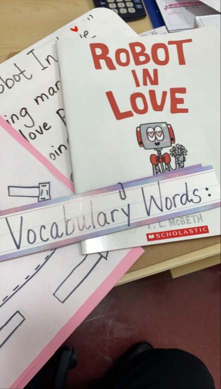 Children's book "Robot in Love" with a "Vocabulary Words" activity.
