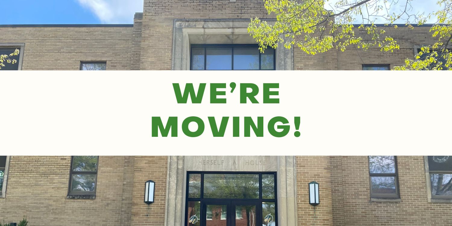 Building with a "We're Moving!" announcement.