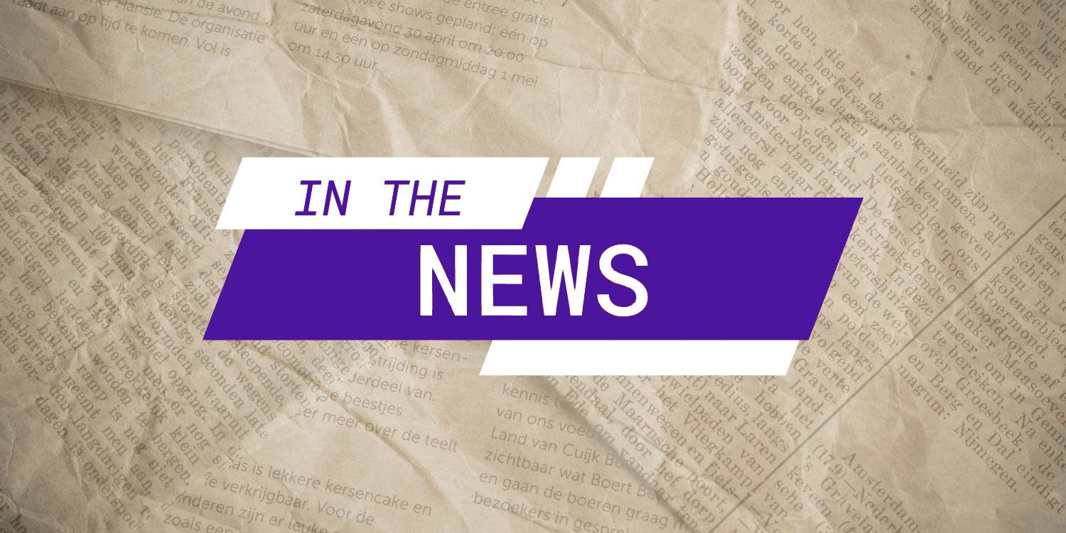 Graphic with "IN THE NEWS" over newspaper.