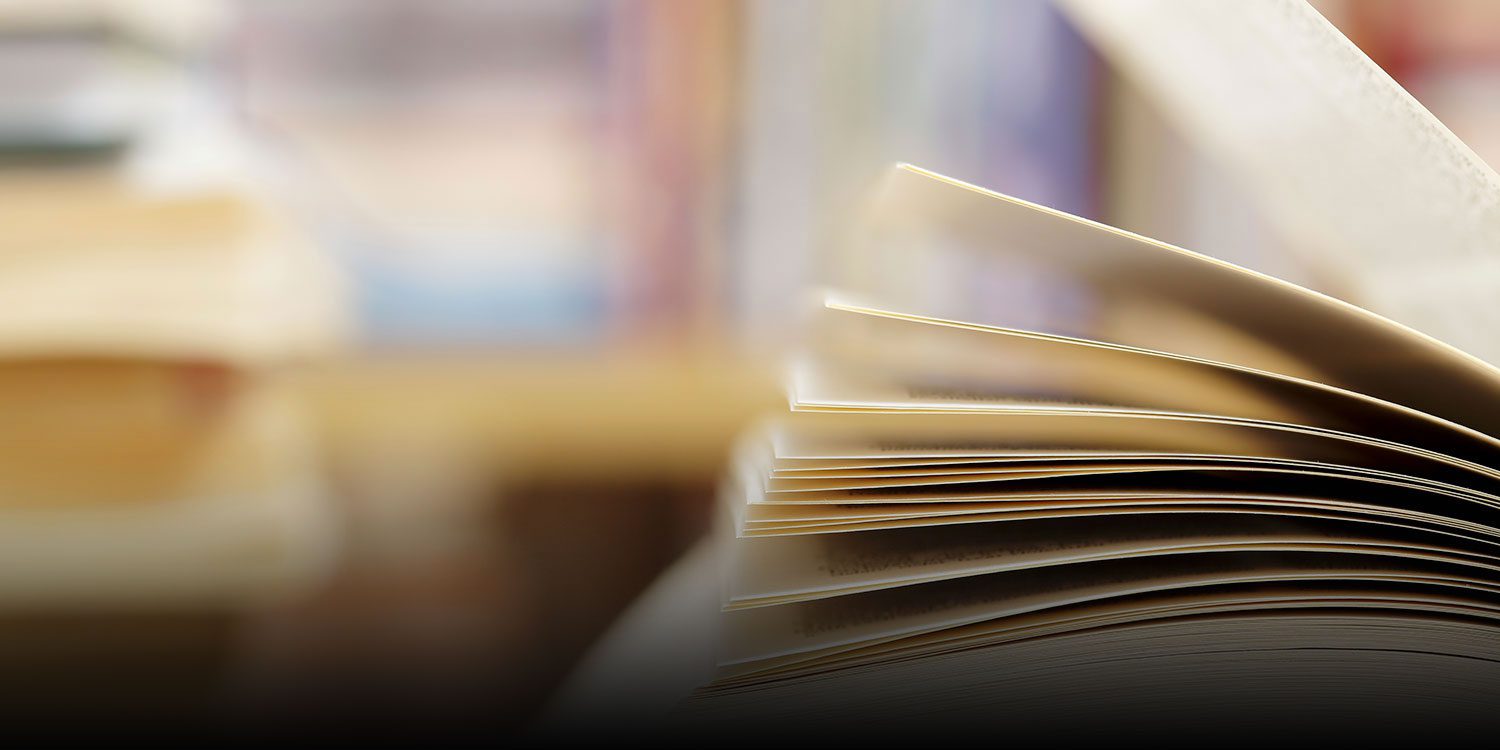 Open book with pages fanned out, ready for reading.