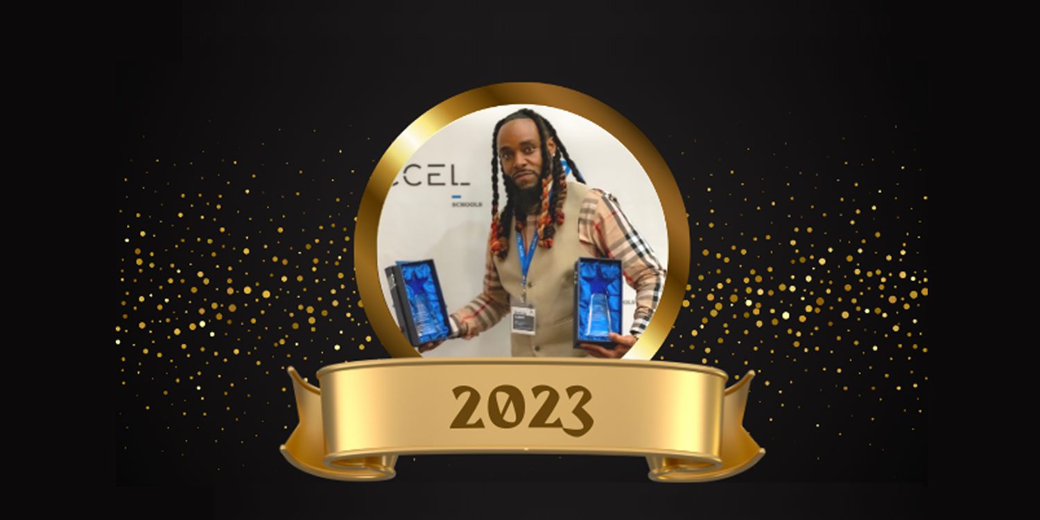 Adult holding two star awards in a gold celebratory frame.
