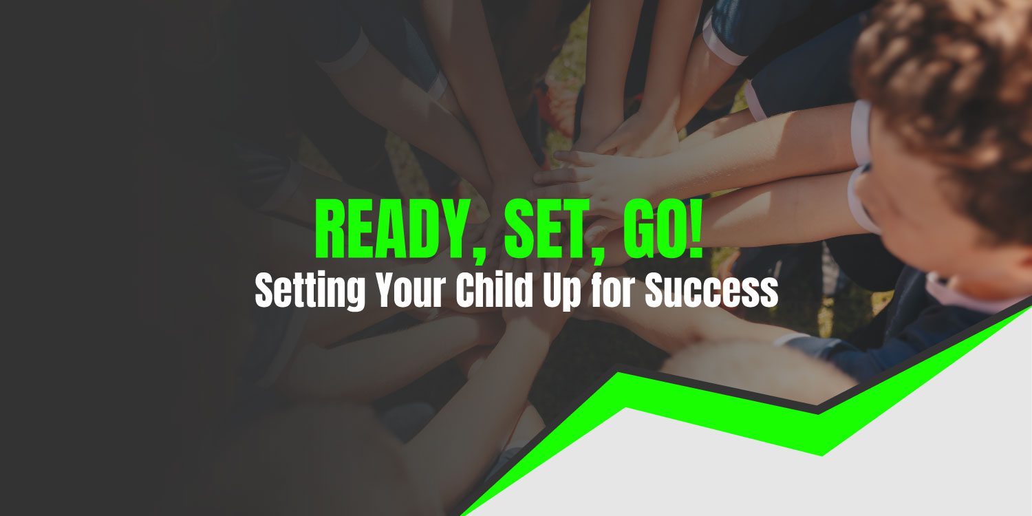 Children's hands stacked, symbolizing teamwork.