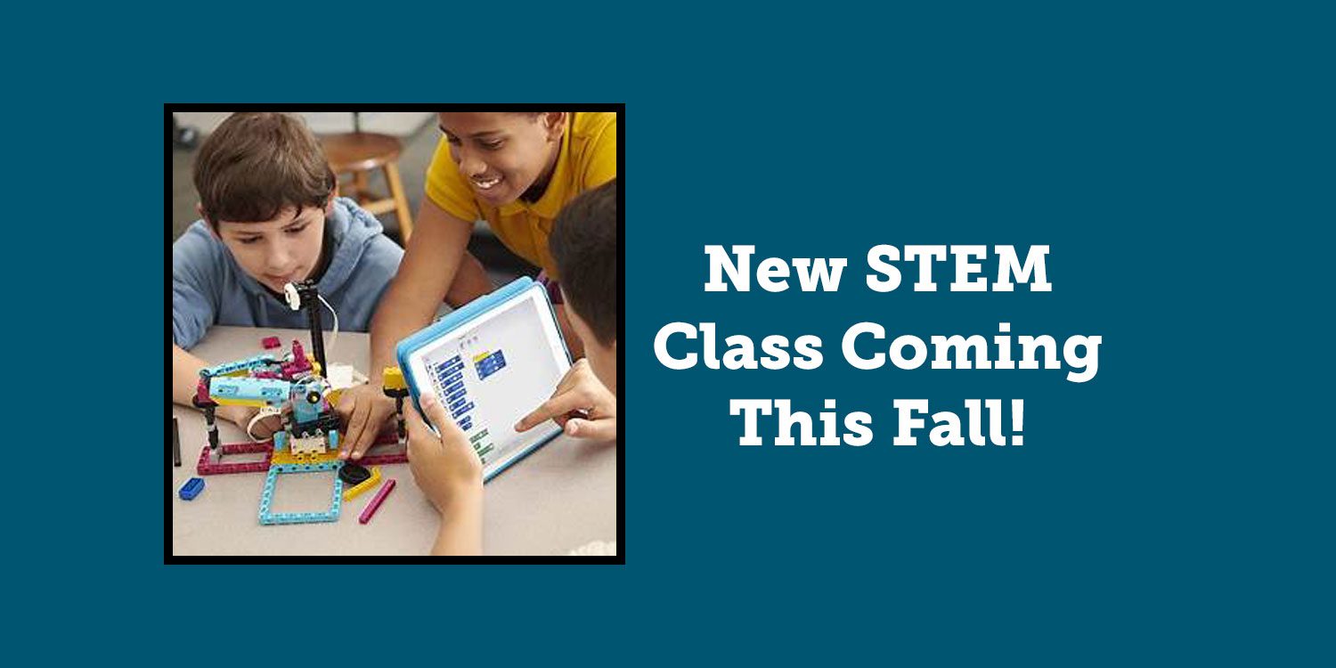 Children building with a construction set and using a tablet for STEM learning.