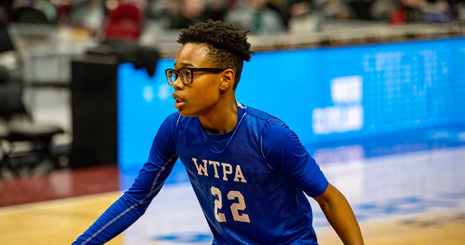 Child in blue jersey with "WTPA" and "22" on it.