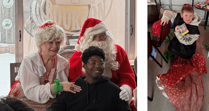 Santa, Mrs. Claus, and two children smiling with gifts.